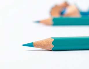 Obraz premium Teal wooden pencil with sharpened tip and white eraser, horizontal position, isolated on white 