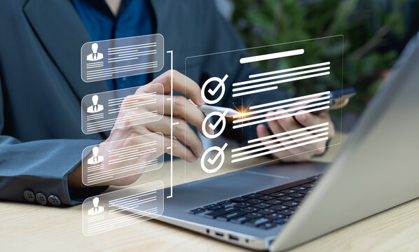 Businessman filling out online employee evaluation form. HR management concept for recruitment, leadership assessment and team building in digital workplace.