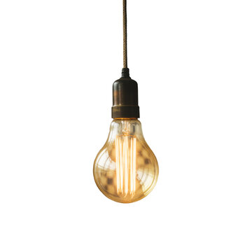 Vintage edison light bulb hanging from a cord isolated on transparent background