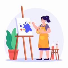 Fototapeta premium A smiling female artist in a yellow apron painting a colorful abstract piece on a canvas at her easel.