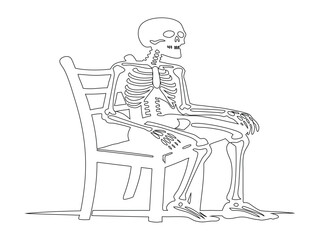 Skeleton sitting on a chair