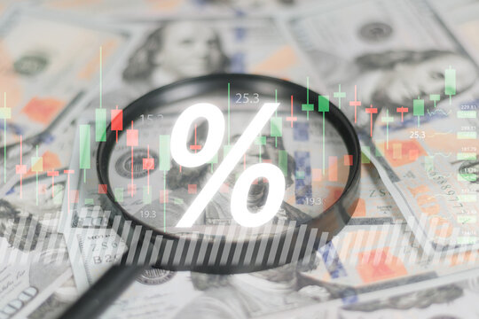 Magnifier glass to focus on 100 USD dollar banknote with update and down arrow for Federal or FED increase and decrease percentage of interest to reduce inflation crisis concept.