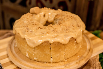 Close up of cornmeal cake with peanut topping