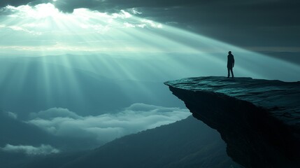 Person on Cliff Edge Overlooking Mountain Landscape with Light Rays