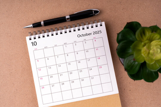 October 2025 desk calendar flat lay