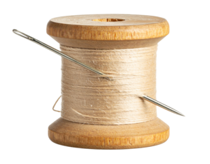  “Vintage Wooden Spool with Threaded Needle Inserted, Isolated PNG”.