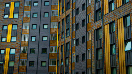 Fototapeta premium yellow brick facade; apartments