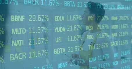 Woman analyst adjusting marker and noting cycling stock percentages overlay in finance meeting - Powered by Adobe