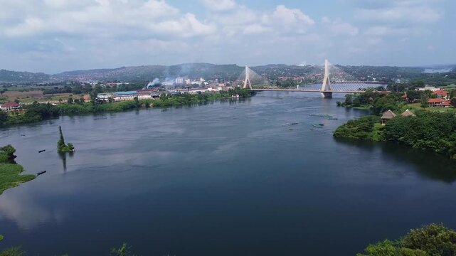A Panoramic View of Jinja, Uganda, Featuring the Nile River and the Cable Bridge.