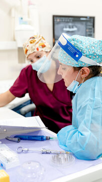 Dental professionals in a clinic specializing in implants