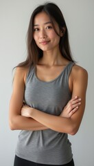 Obraz premium Confident woman in a casual gray tank top