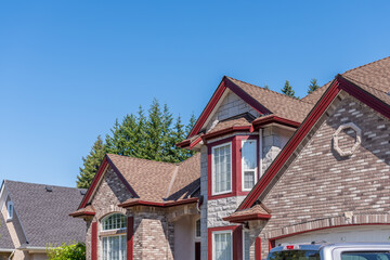Top of luxury house with shingle roof and nice windows in Summer in Vancouver, Canada, North America. Day time on August 2025.