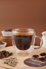 Various coffee drinks with chocolate truffles, beans and milk on beige background. Cozy flat lay for cafes, baristas, dessert menus, social media and coffee branding.