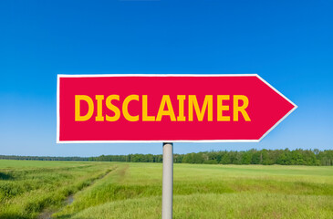 Disclaimer symbol. Concept word Disclaimer on beautiful red road sign. Beautiful blue sky green grass and forest peaceful nature background. Business disclaimer concept. Copy space.