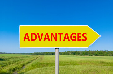 Advantages symbol. Concept word Advantages on beautiful yellow road sign. Beautiful blue sky green grass and forest peaceful nature background. Business advantages concept. Copy space.
