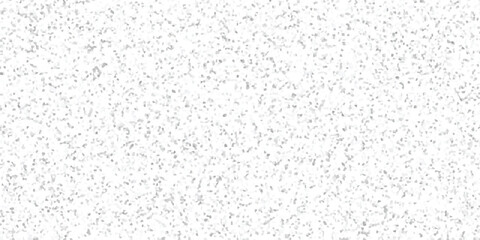 Abstract textured background with a random mosaic of small geometric shapes in varying shades of gray