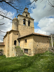 Fototapeta premium Bell gable and stone facade of Ermita de la Tida in Villaescusa de las Torres
