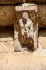 Romanesque corbel with human figure in El Salvador Church Pozancos Palencia © Agustin