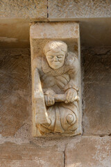Romanesque corbel with human figure in El Salvador Church Pozancos Palencia © Agustin