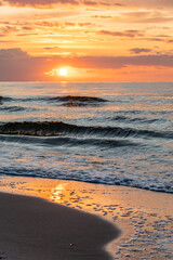 Baltic sea coast during colorful summer sunset