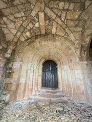 Wooden door of San Juan Bautista Church in Pomar de Valdivia, Palencia
