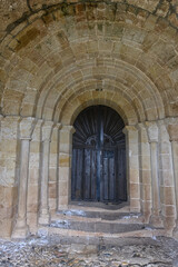 Romanesque stone doorway of San Esteban Church in Lomilla