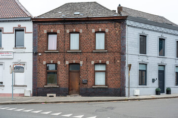 Old brick stone houses in a row in Baudour, Saint Ghislan, Belgium