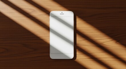 Shadows Play on Phone: An elegant phone is positioned on a wooden surface, illuminated by the sunlight streaming through the blinds creating dramatic shadows 