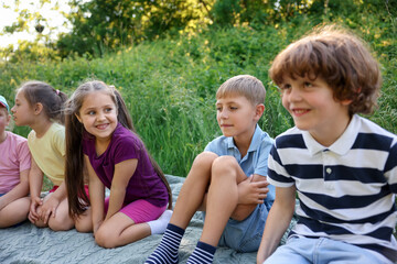 Fototapeta premium Children spending time in nature on summer day