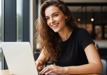 Smiling Young Woman Working on Laptop in Cafe Modern Workspace and Enjoying Success