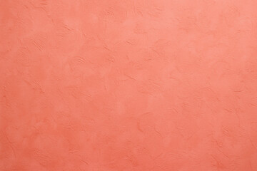Coral pink decorative plaster texture background