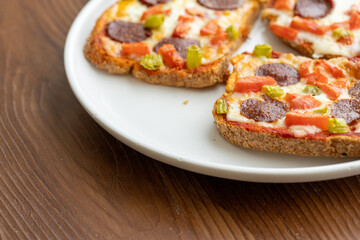 Italian bruschetta pizza made with toasted diet bread