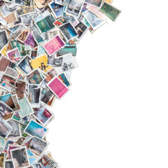 Colorful travel postcards arranged as a frame, black background, memory concept, website banner