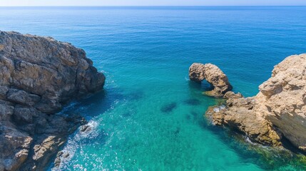 Fototapeta premium Scenic ocean coastline with rock formations aerial view