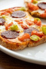 Italian bruschetta pizza made with toasted diet bread