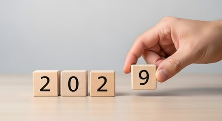 Happy new year concept 2029 wooden blocks hand changing year from 2028 to 2029 new year coming