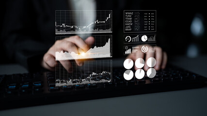 A business professional engages in financial analysis, surrounded by digital graphs and charts, highlighting modern analytics in an office environment. Impute