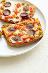 Italian bruschetta pizza made with toasted diet bread
