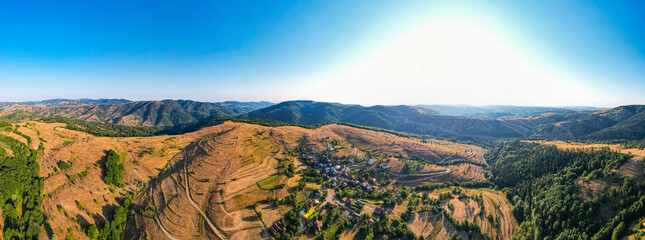 View of a village on a high plateau. Aerial shot of the village with a drone. Beautiful nature landscape.