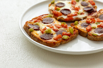 Italian bruschetta pizza made with toasted diet bread