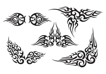 Obraz premium Collection of Black Tribal Flame Tattoo Designs on White Background