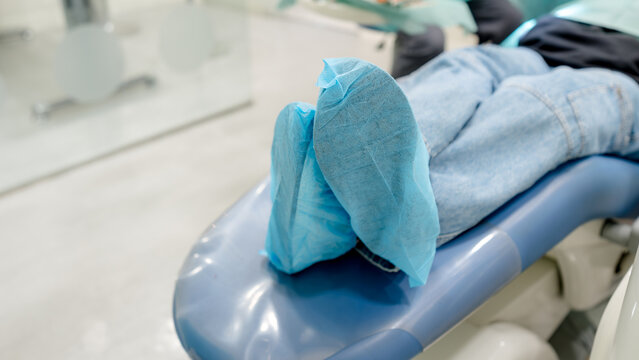 Dental patient in chair during procedure