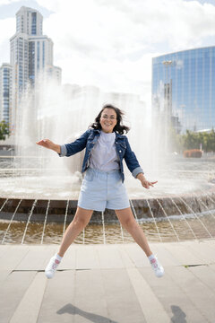 Happy Tourist Woman Exploring Yekaterinburg on a Sunny Day