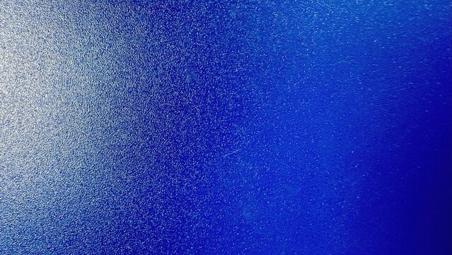 textured royal blue metallic surface with subtle gradient lighting ideal for background designs or tech product mockups

 - Powered by Adobe