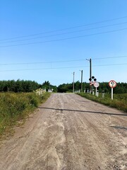 railroad crossing in the countryside