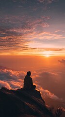 Obraz premium Serene contemplation at dawn: A solitary figure finds peace above the clouds and horizon