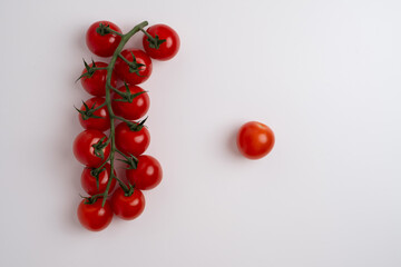 Fresh red tomatoes on white background or light table. Concept farm vegetables and varieties. Space for text