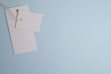 Mockup of clothing tag on color background. clothing brand concept