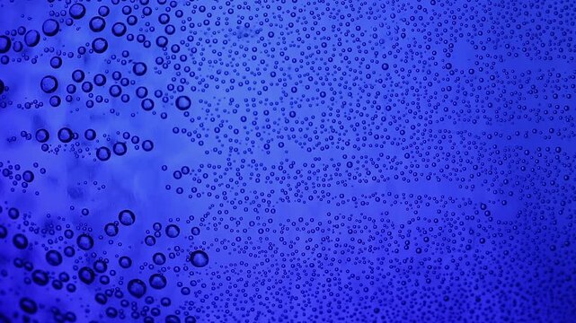Macro Close up of water bubble inside of a glass bottle 

