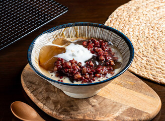 Red Bean Aiyu Dessert with Creamy Milk in bowl side view of taiwan food